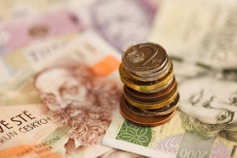 Czech currency, coins on banknotes.