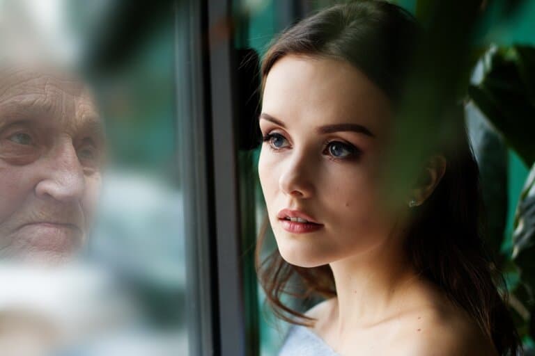 Woman looking into her future self