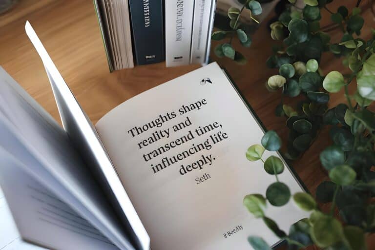 Open book with inspirational quote, surrounded by plants